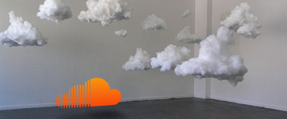 Clouds floating in an empty room, with the SoundCloud logo